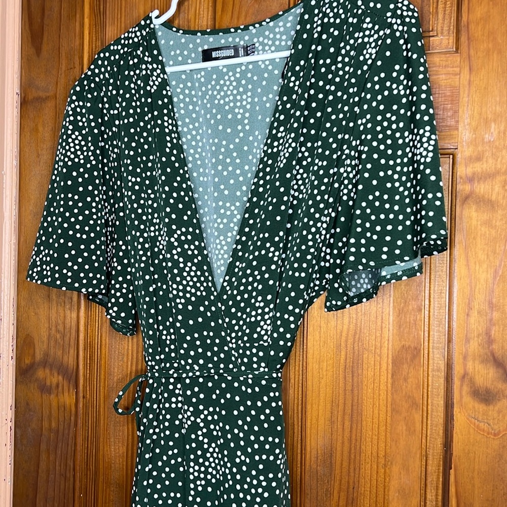 Polka dot asymmetrical wrap dress